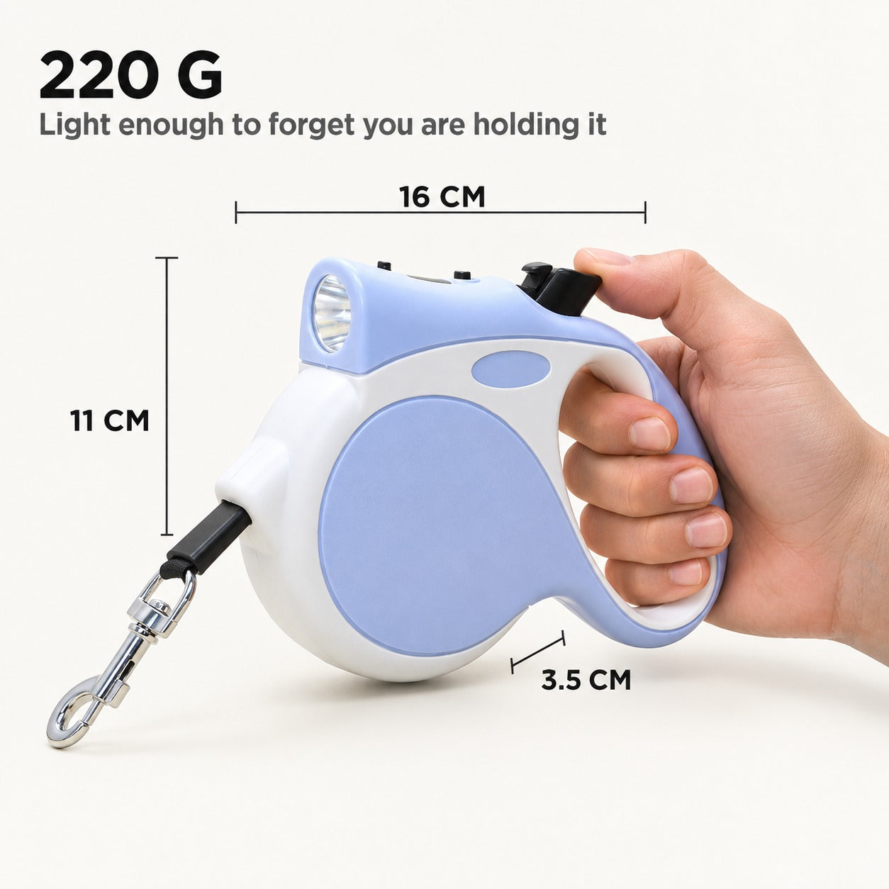 PETHART retractable dog leash handle held in one hand, 16 x 11 x 3.5 cm and 220 g